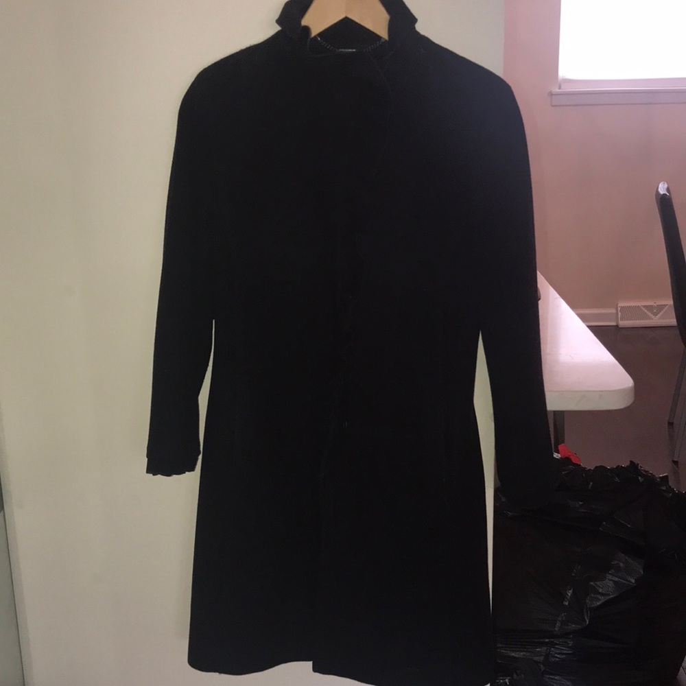 Black wool coat with ruffles on sleeves & collar